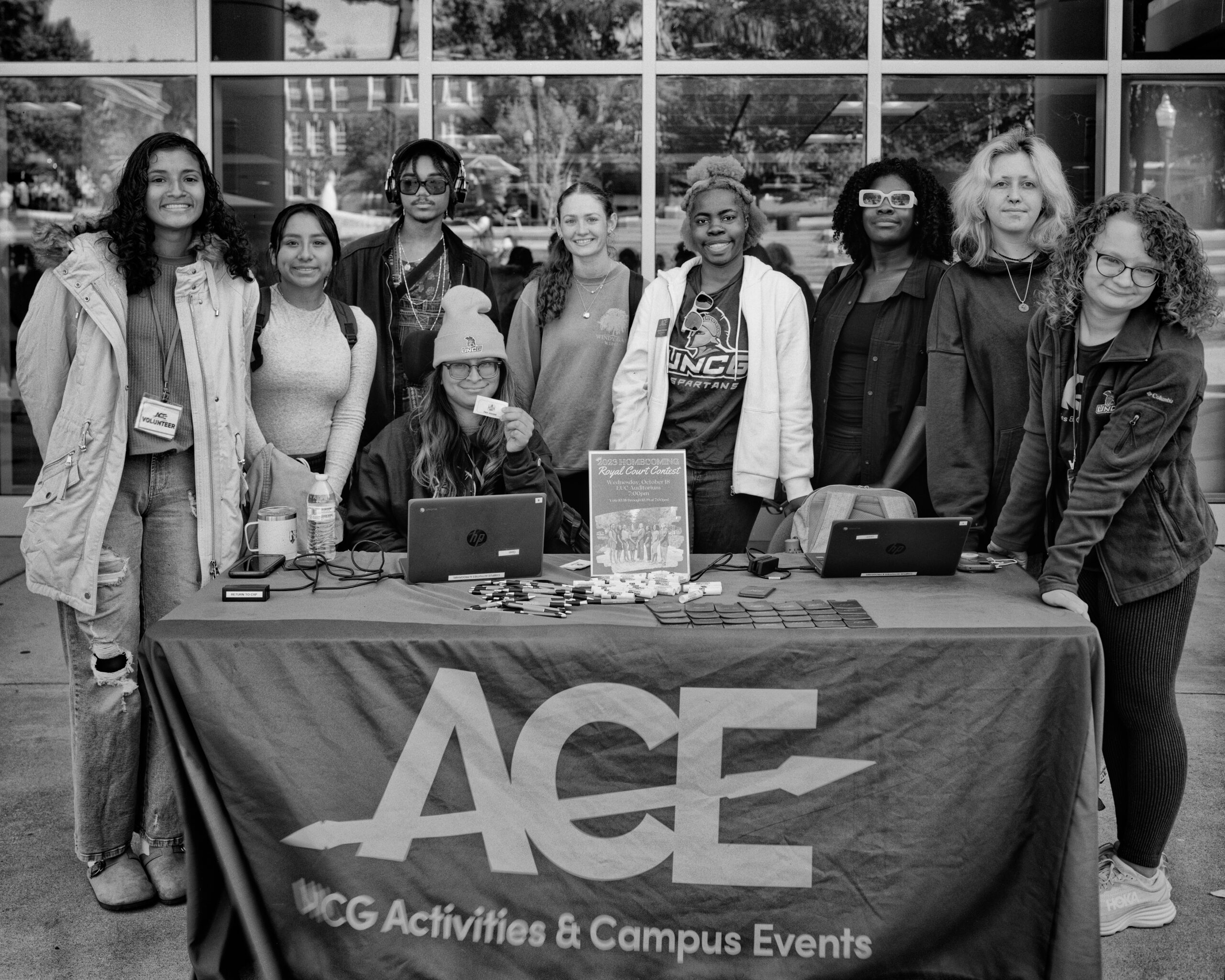 UNCG students gather around a table for a student group called ACE.