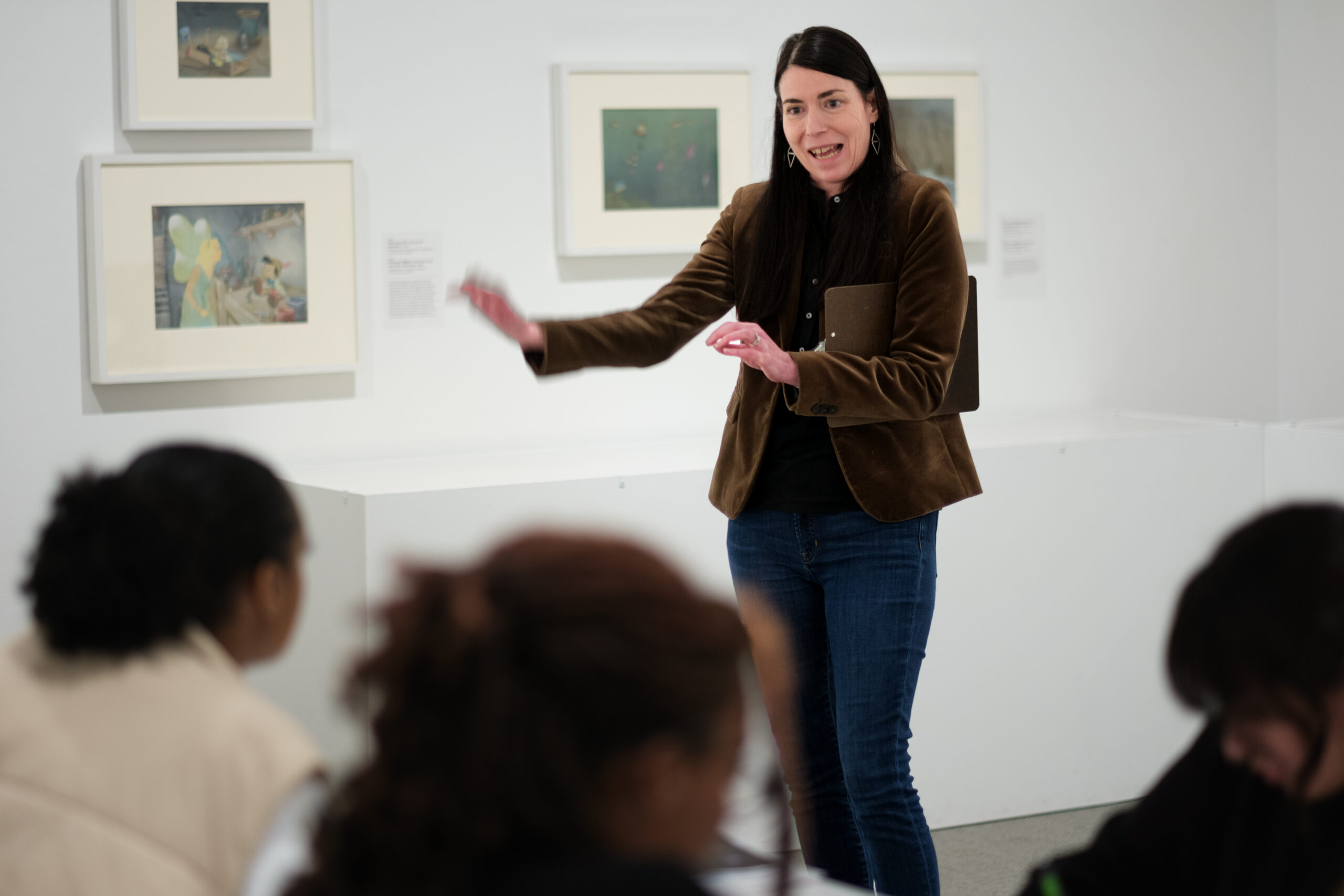 Dr. Heather Holian teaches students in the UNCG Weatherspoon Art Museum.