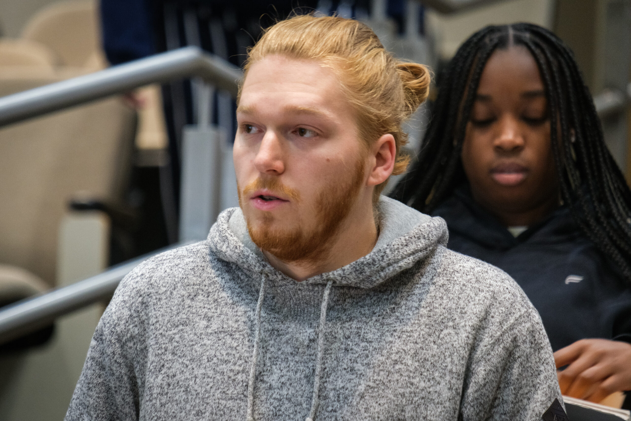 A student sits in a UNCG lecture