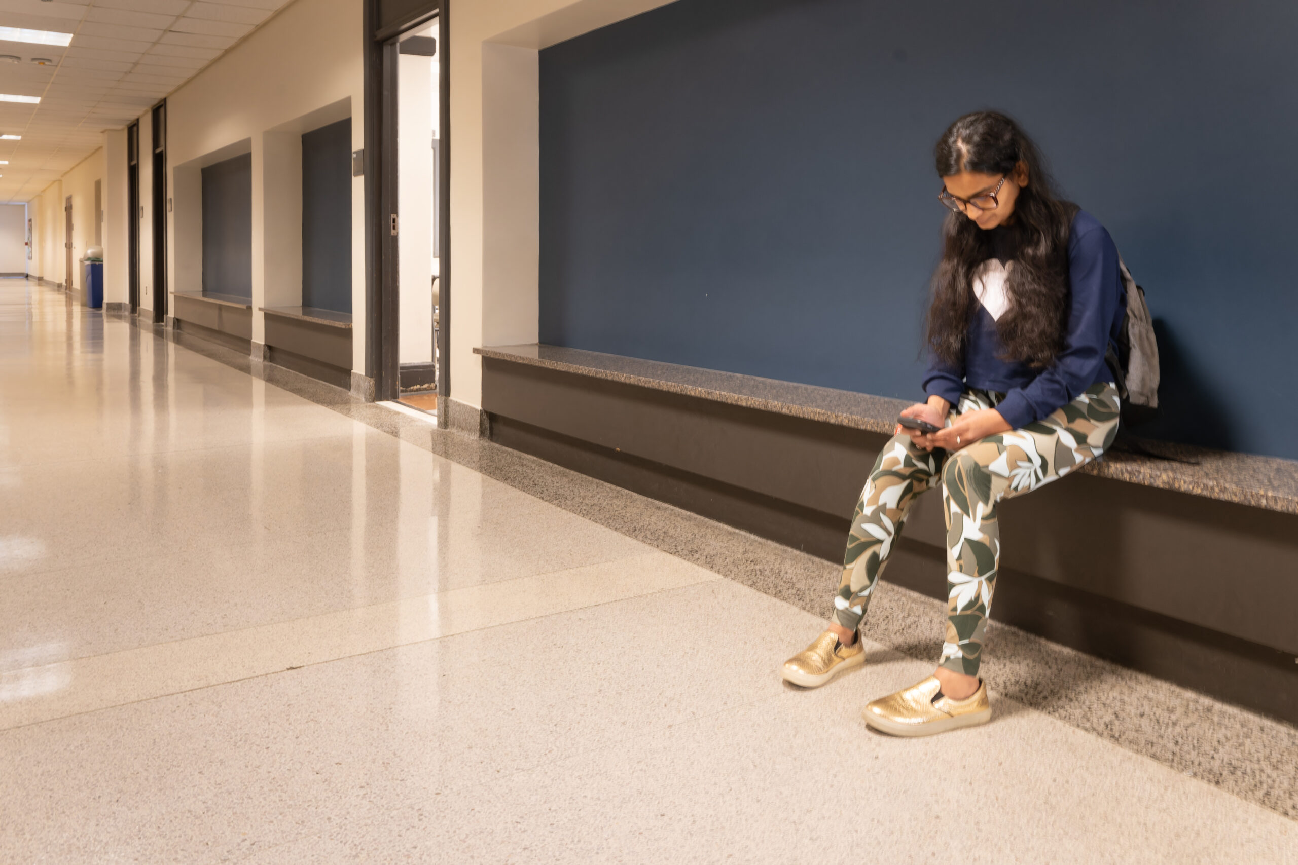 Shreya Jayes, junior Computer Science major, waiting for class to start.