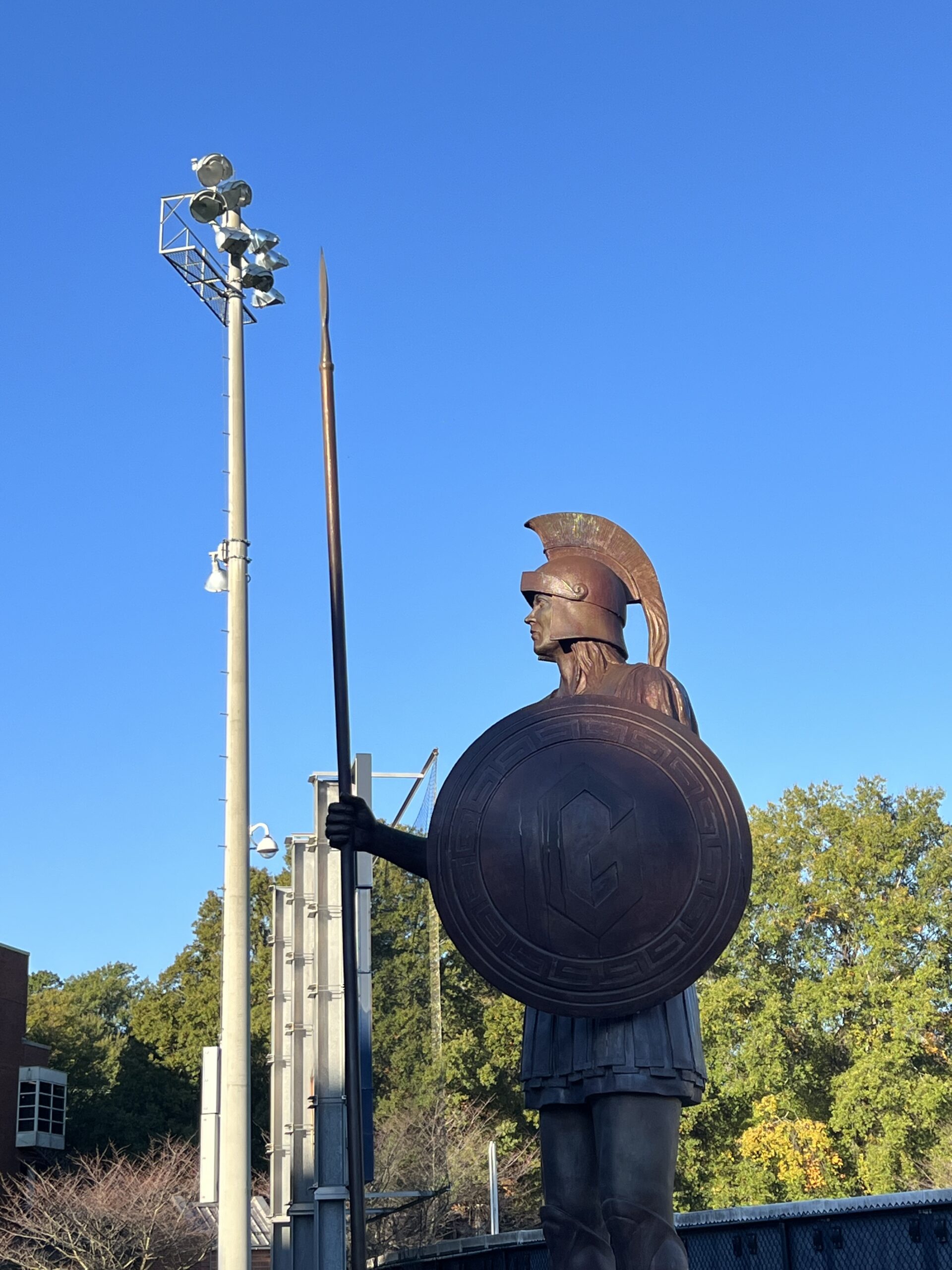 The Spiro Statue illuminated by the sunrise.