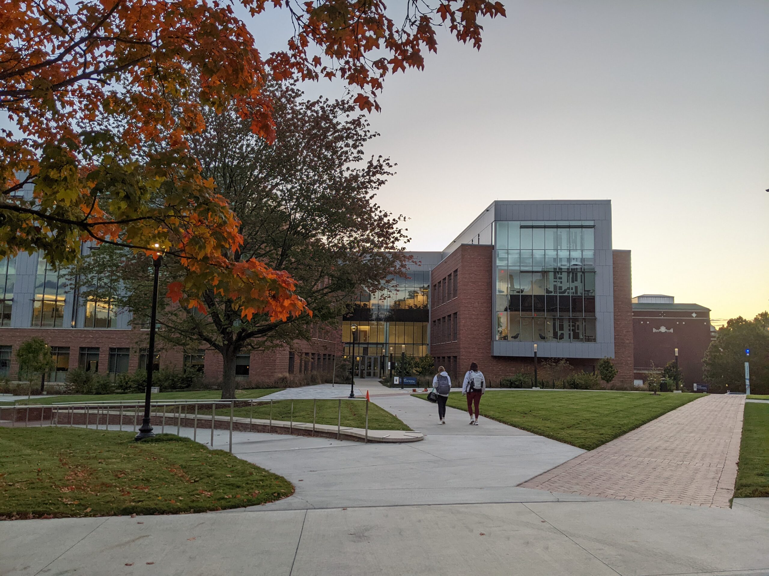 UNCG students walk into the NIB building.