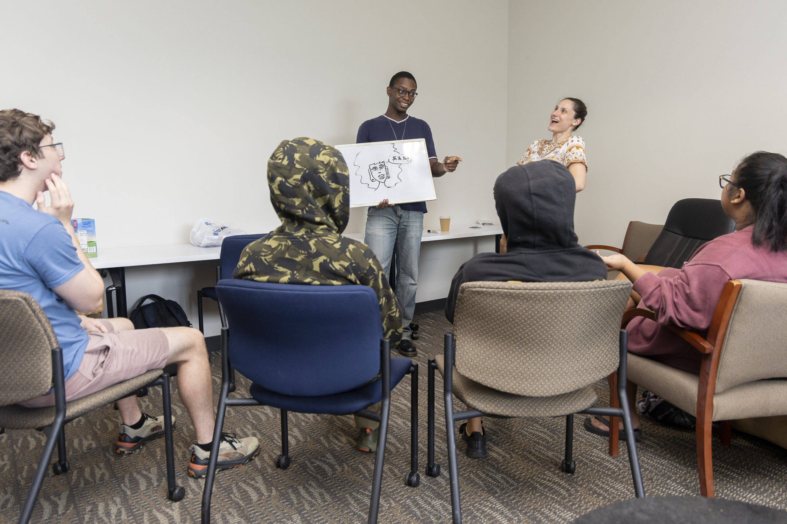 students gathered playing games