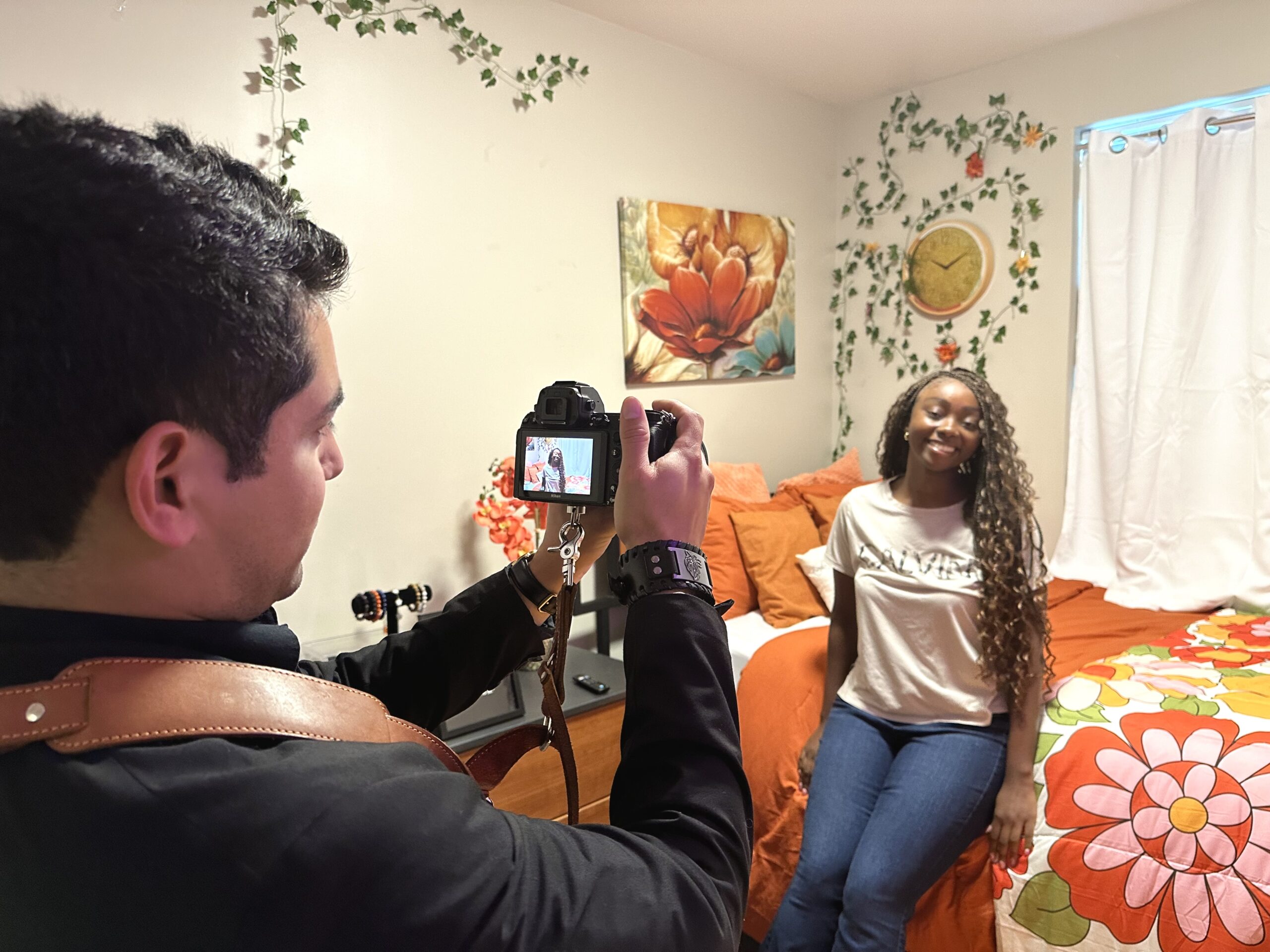 Biology major McKayla Green, a finalist in Housing and Residence Life’s Best Dressed Room contest, poses for a photo during a visit from judges.