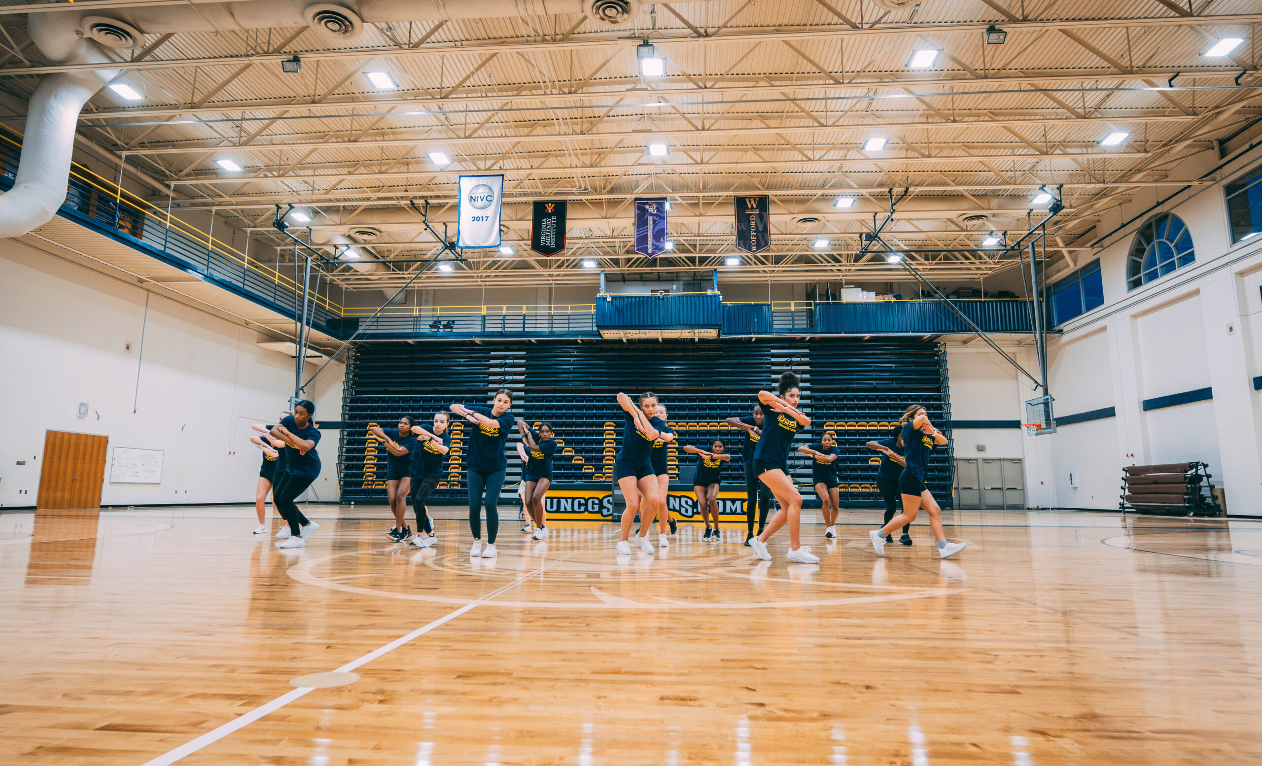 Dance team practices in Fleming Gym.