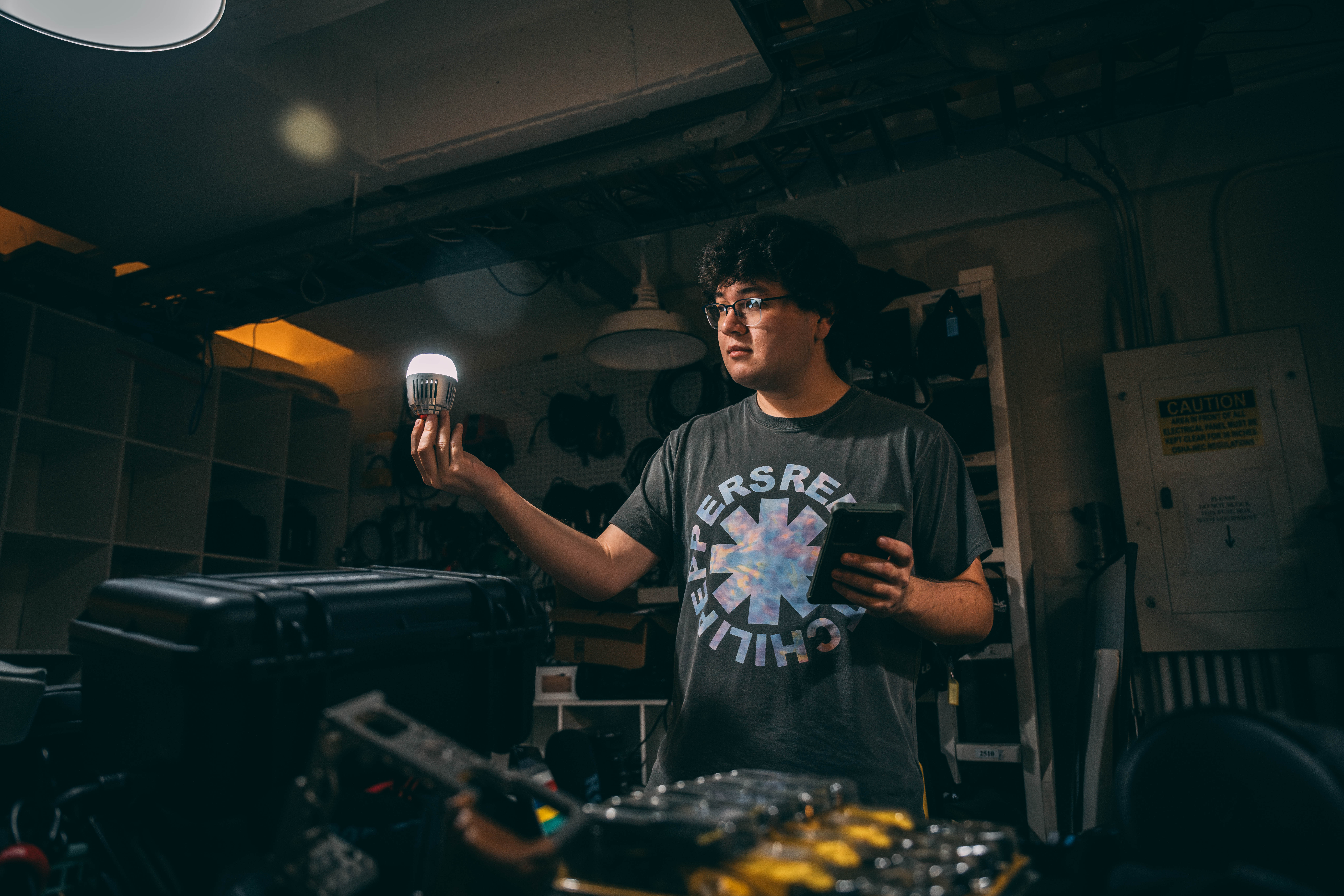 In UNCG's Carmichael Building Equipment Room, Media Studies work and rent out gear for student projects.