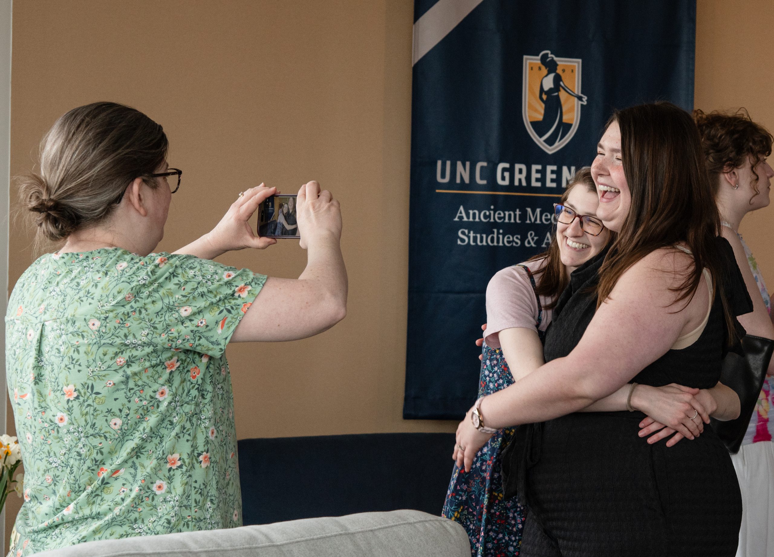 Students celebrate their induction into the Sigma Tau Delta Society