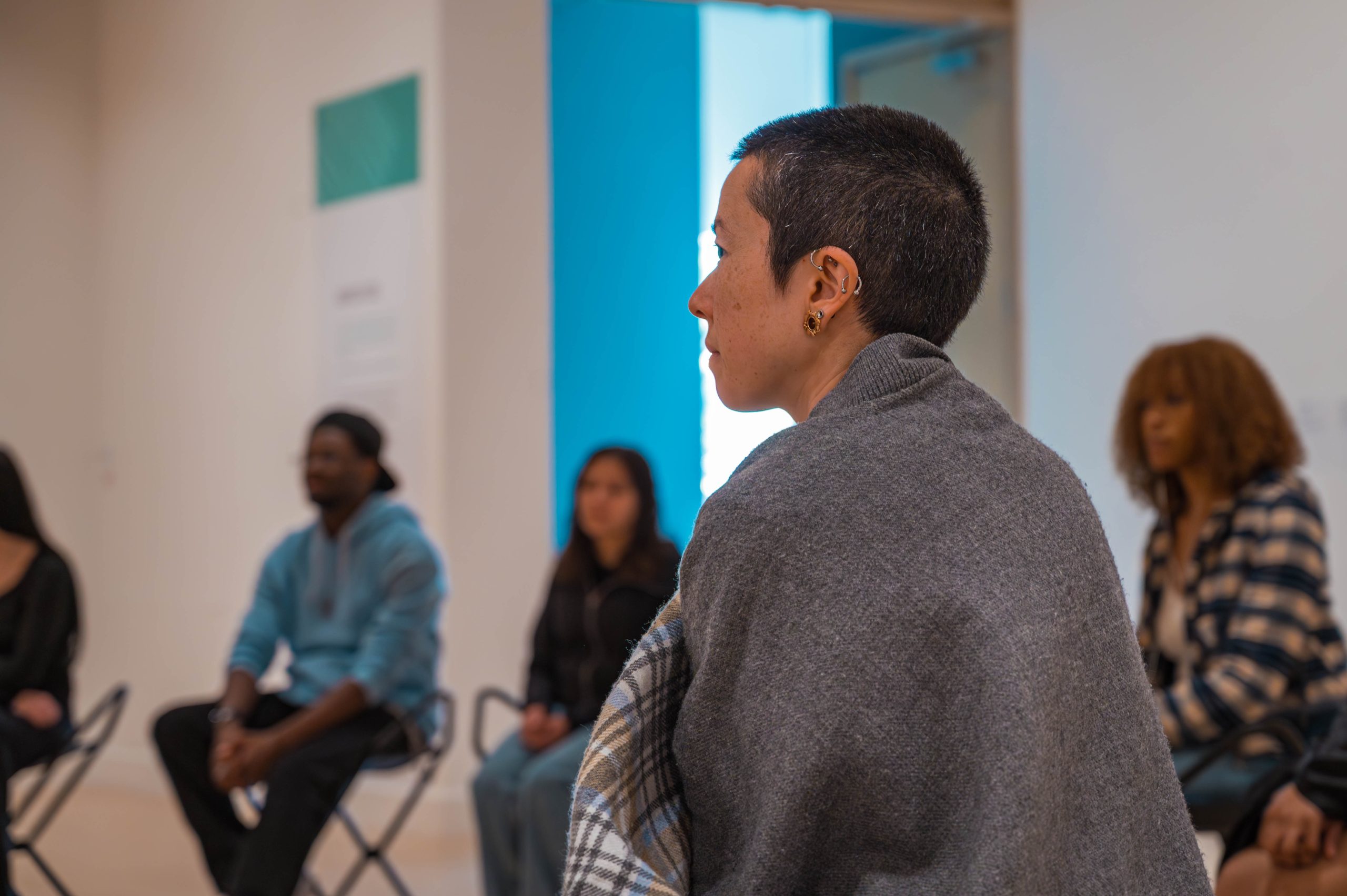 Weatherspoon Art Museum's Associate Curator of Programming Raechel Cook leads a discussion with students.