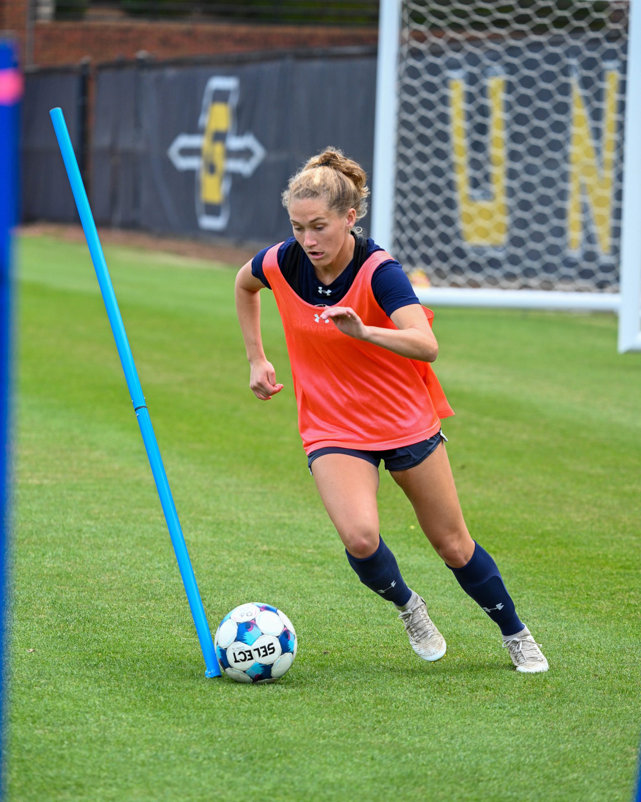 Women's soccer student-athlete at practice at UNCG Soccer Stadium