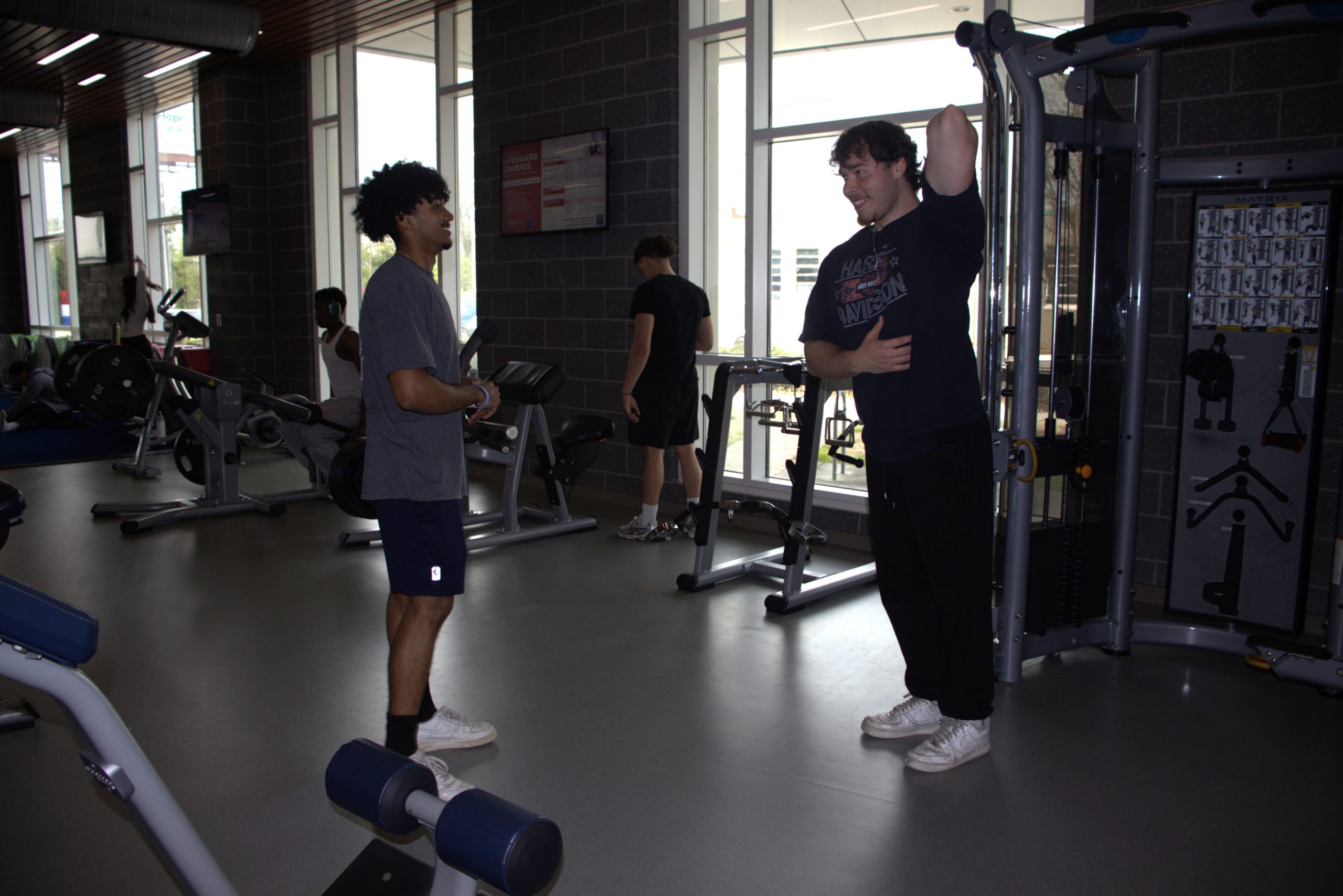 Working out with a friend at the Kaplan Center's gym.