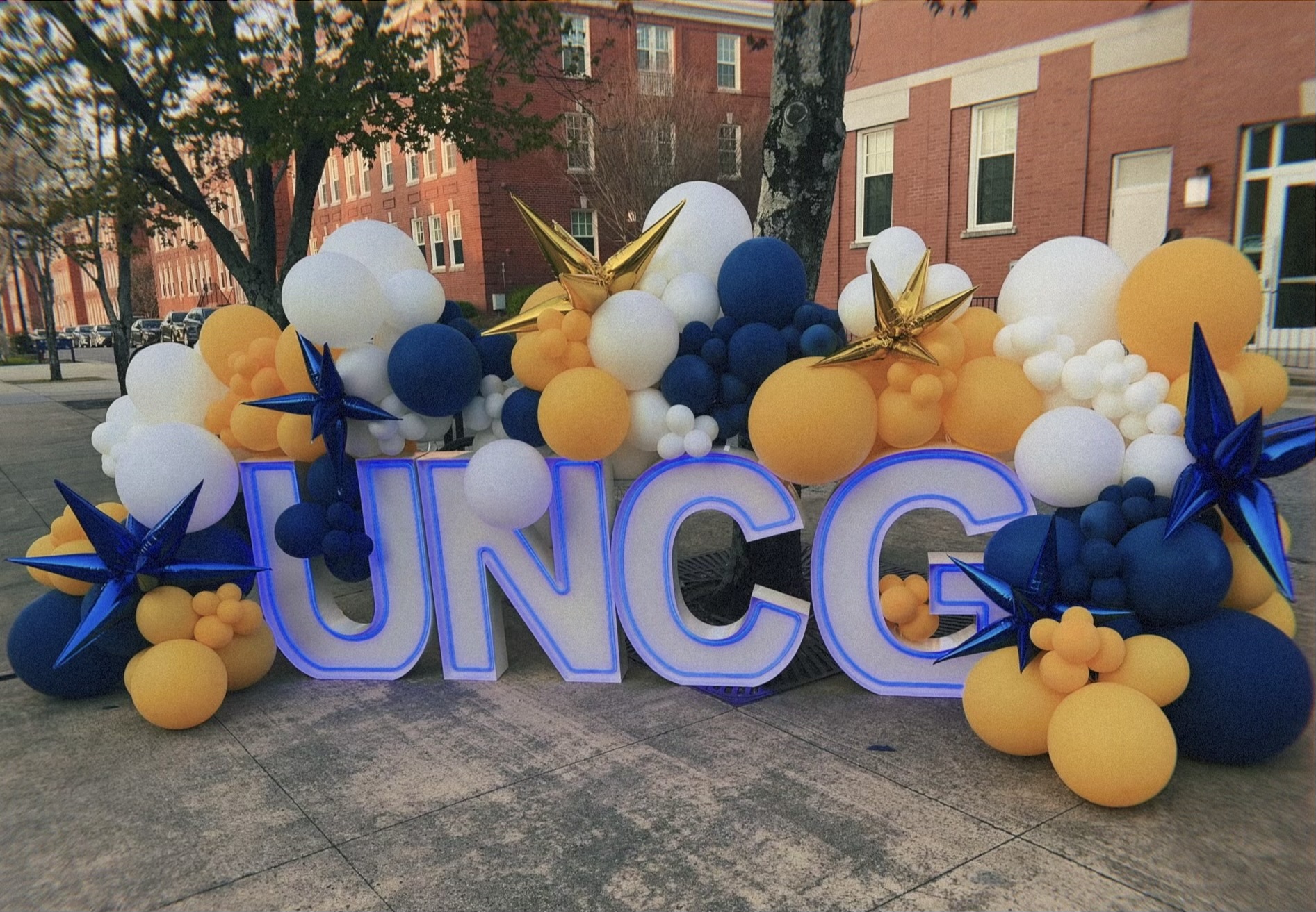 UNCG letters and balloons for a photo backdrop.