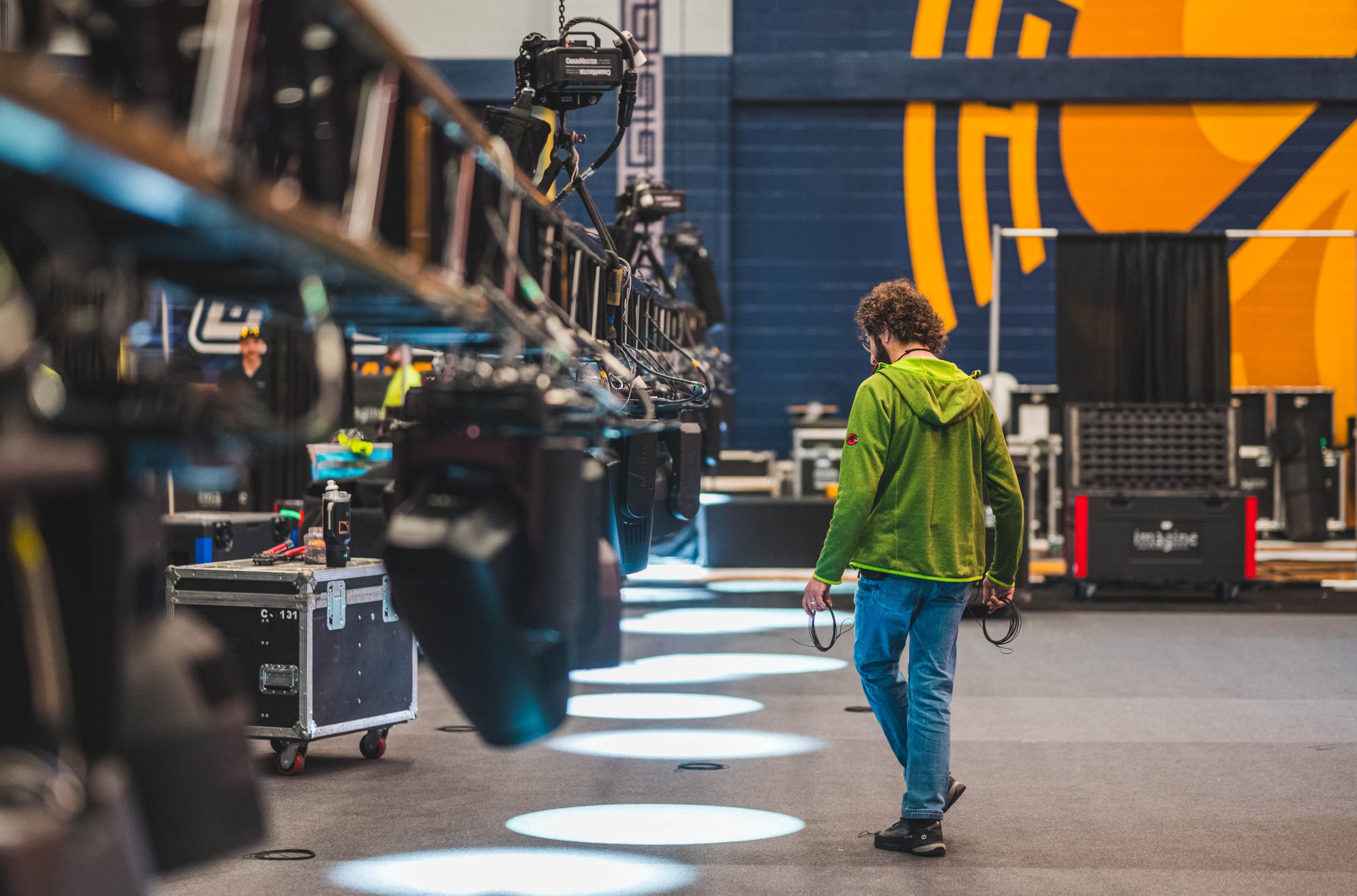 A behind the scenes moment as University Advancement sets up at Coleman for the Light The Way Close grand event.