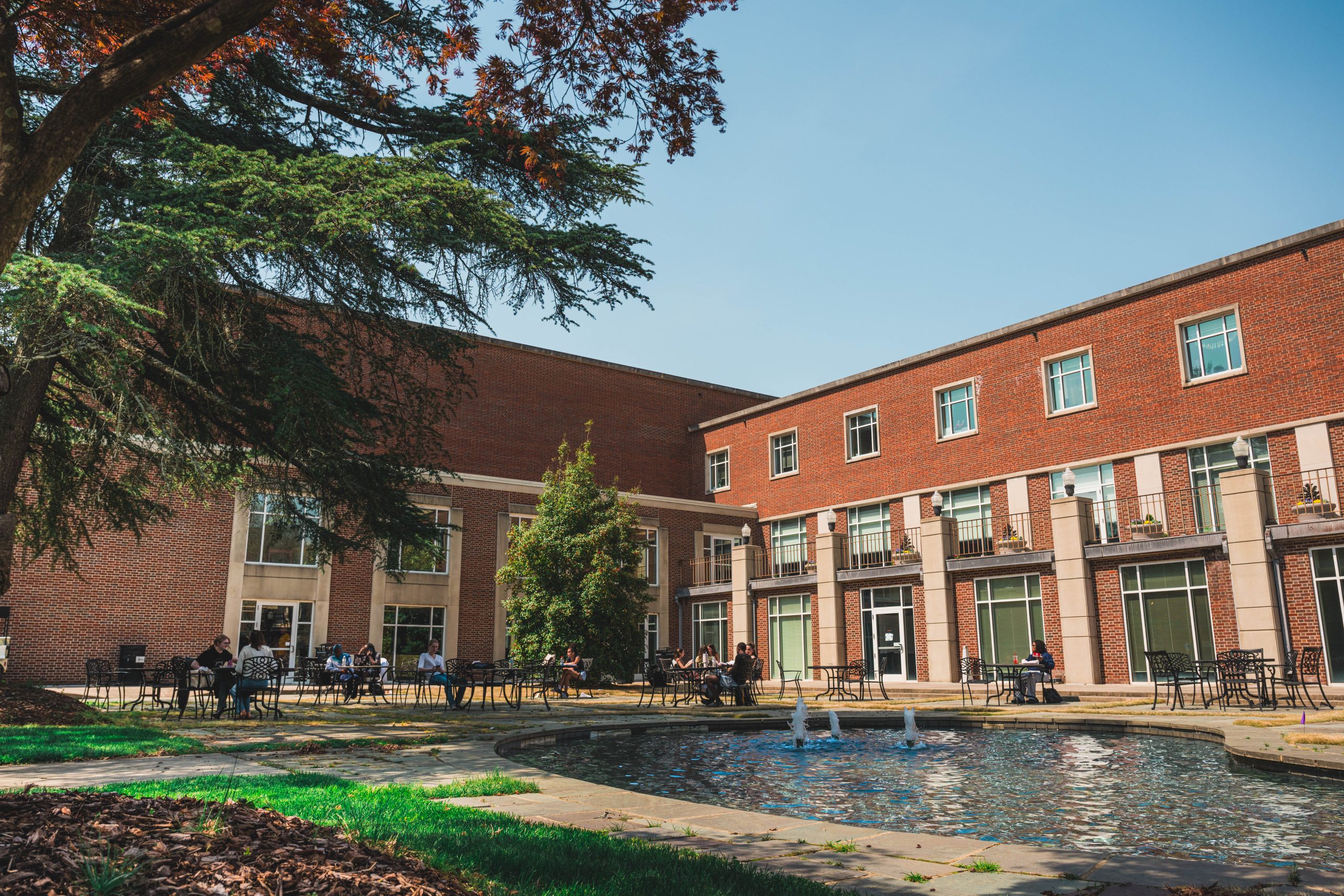 Students studying in the fresh air at one of campus's most popular spot, Taylor Garden.
