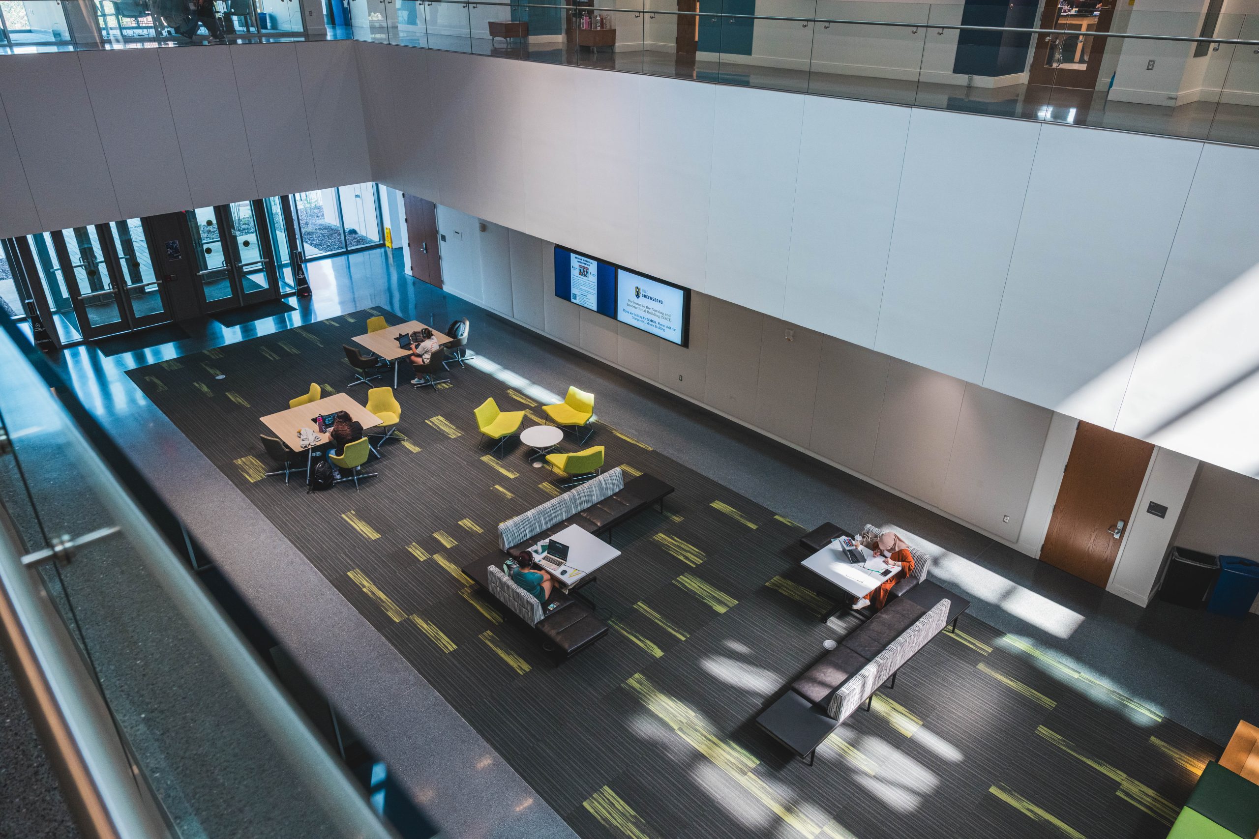 Students study between classes at the Nursing Instructional Building.