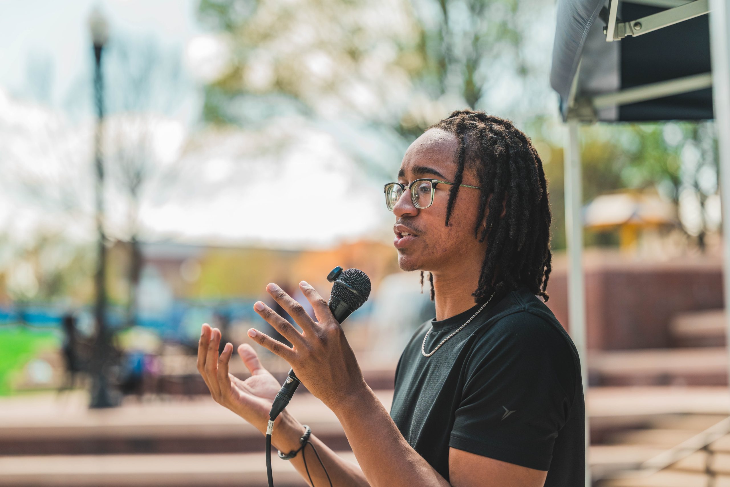 Students tabling at Moran Commons hold an open mic discussion about Life, Philosophy, and Religion for any and all who wanted to speak their mind.