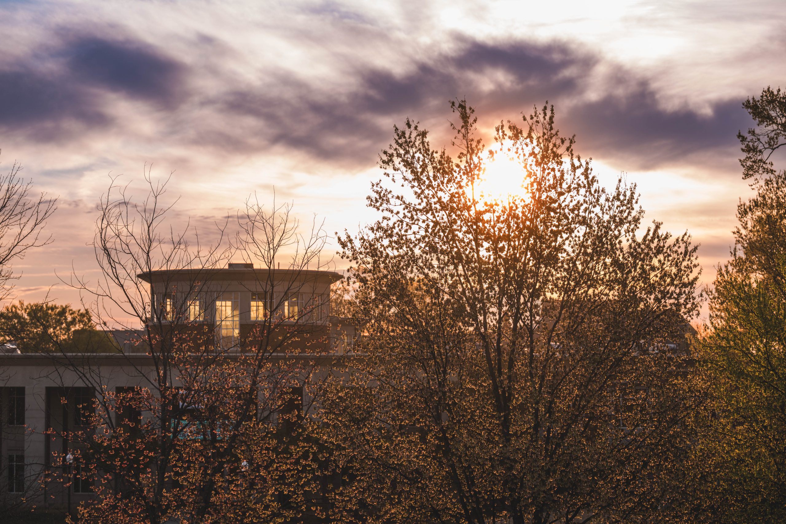 The sun rising above the Elliot University Center on Wednesday morning.
