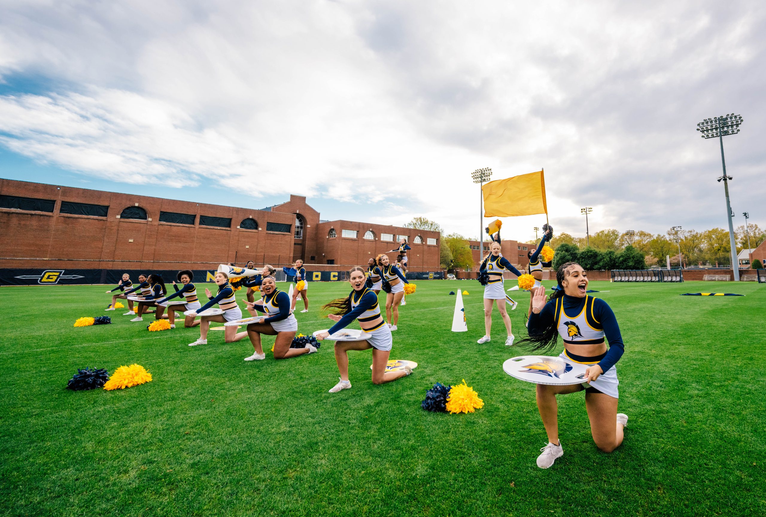 The UNCG Cheer Squad practices its routine in preparation for the Light The Way Campaign Close Event.