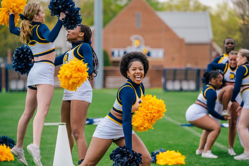 The UNCG Cheer Squad practiced its routine in preparation for the Light The Way Campaign Close Event.
